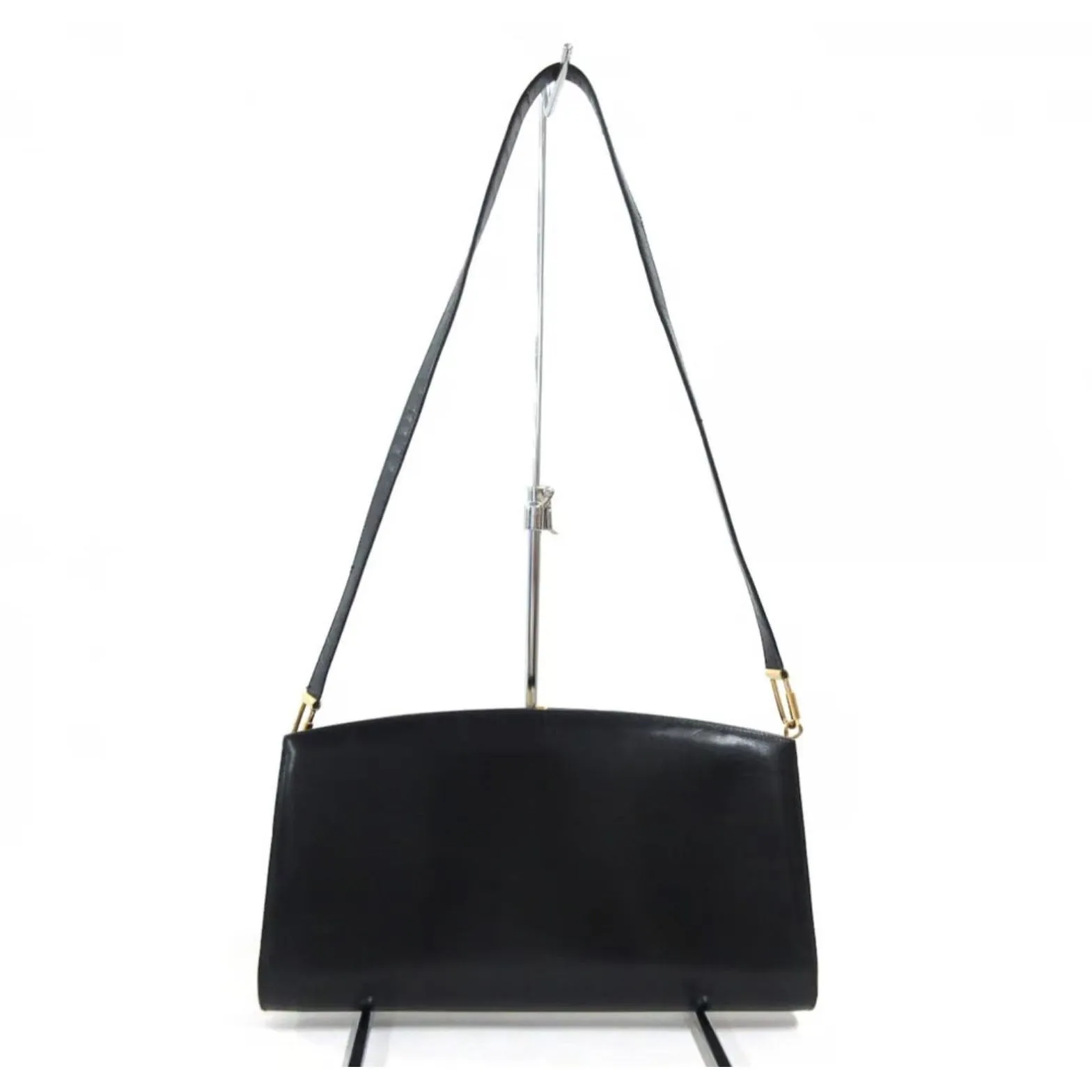 1960s mod, Dior, navy blue leather, two-way style with a hinged top with a latch snap closure, bold, gold Dior accents, & a removable strap