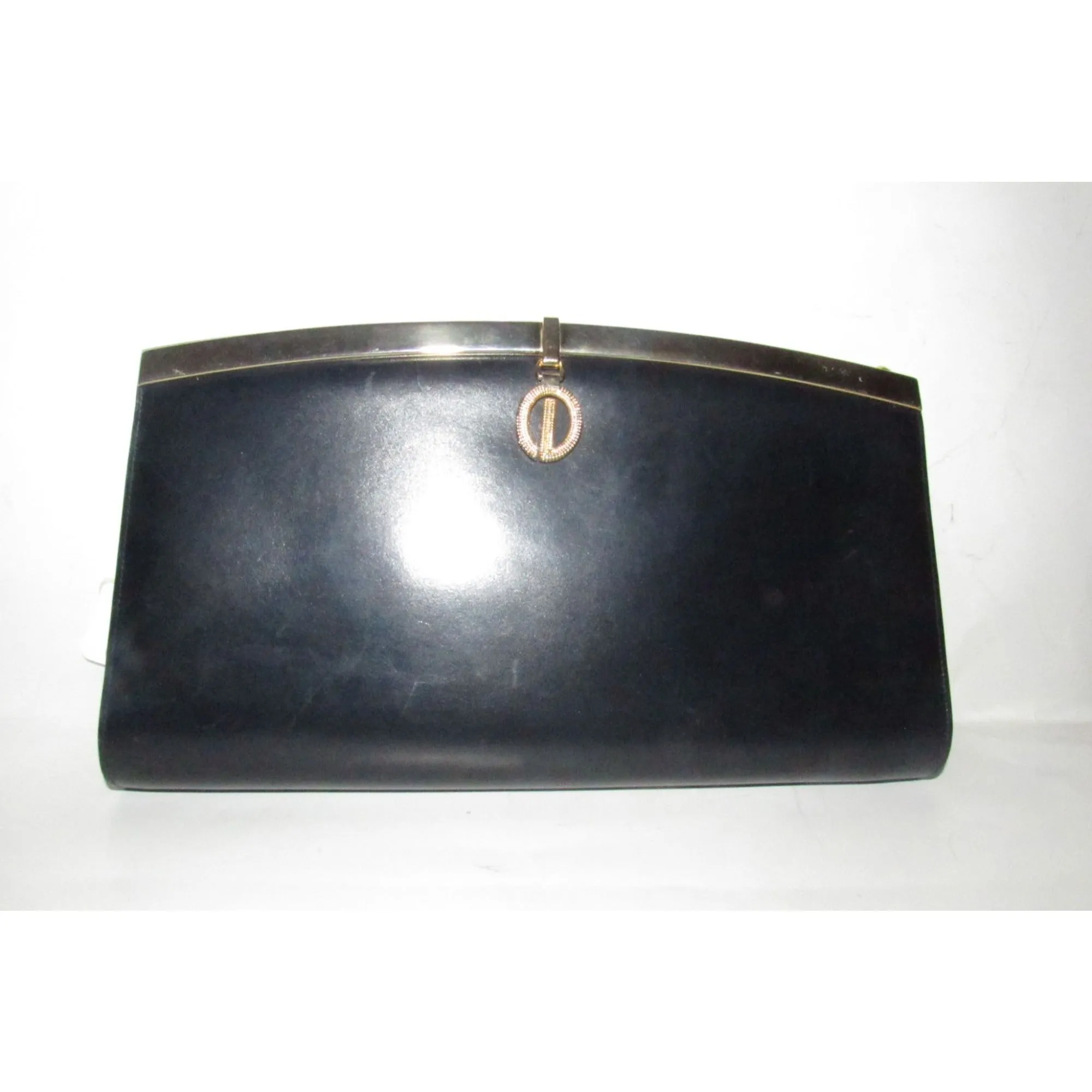 1960s mod, Dior, navy blue leather, two-way style with a hinged top with a latch snap closure, bold, gold Dior accents, & a removable strap